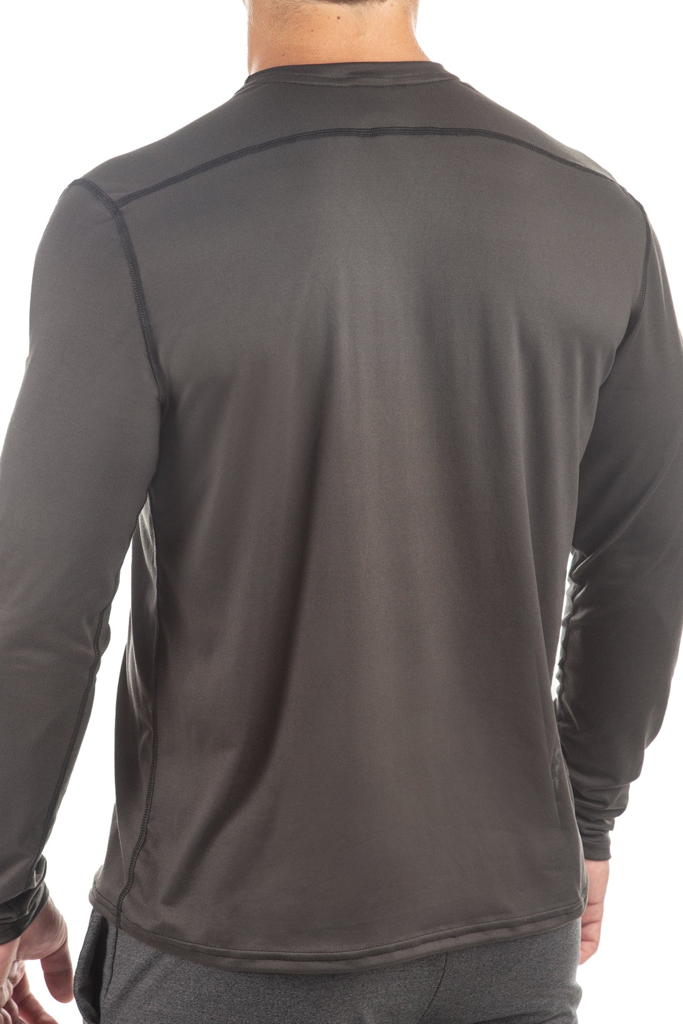 Back view of a person wearing a dark gray long-sleeve athletic shirt on a white background