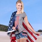 Women wearing patriotic shirt and shorts with the American flag